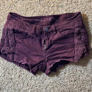 Purple denim shorts with cute lace down the side